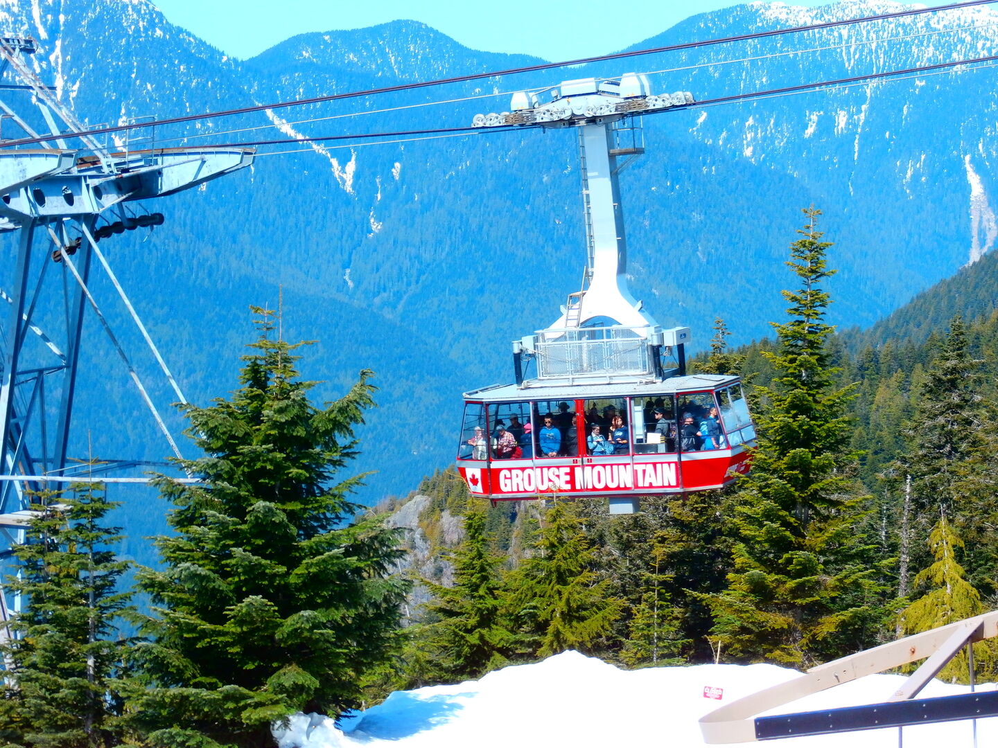 Grouse Mountain cable car with views over Vancouver and the Pacific